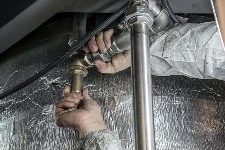 plumber doing work gps fleet tracking