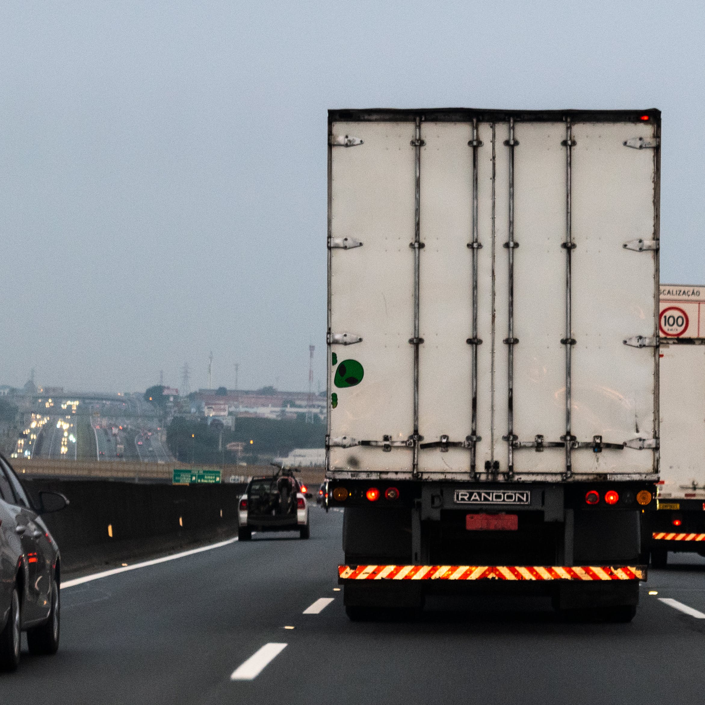 truck driving on highway on route, optimization with gps fleet tracking